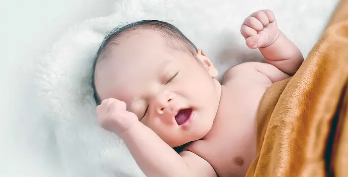 Example of a baby in the "drowsy but awake" state ideal for gentle sleep training