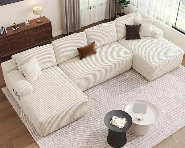 A diagram comparing a hazardous couch feeding setup (deep cushions, baby nestled in corner) vs. a safer, stripped-down adult bed setup for feeding