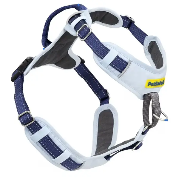 A properly secured harness is a flat, snug fit with no slack or bulky layers underneath