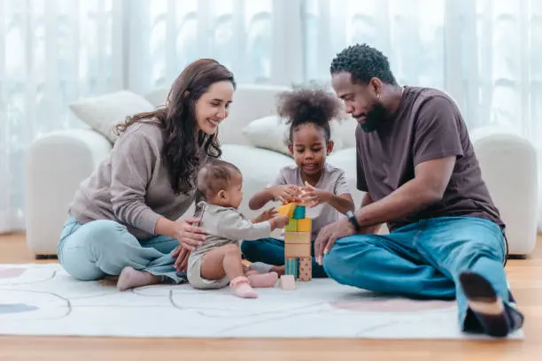 Diverse family representations showing different types of parents connecting with their infants