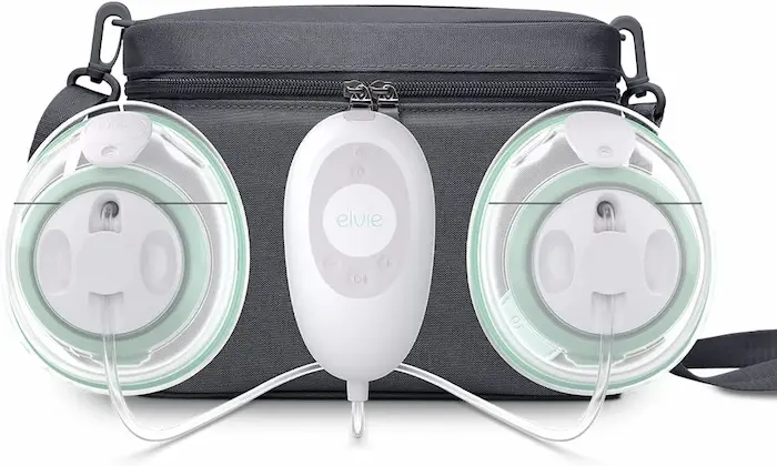 Elvie Stride wearable breast pump kit with charging case organized on counter