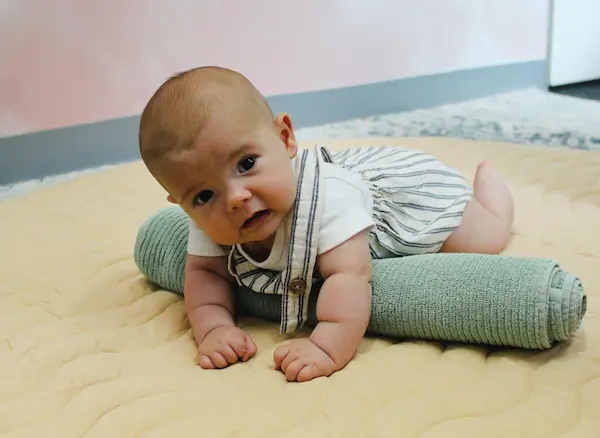 tummy time rolled towel technique